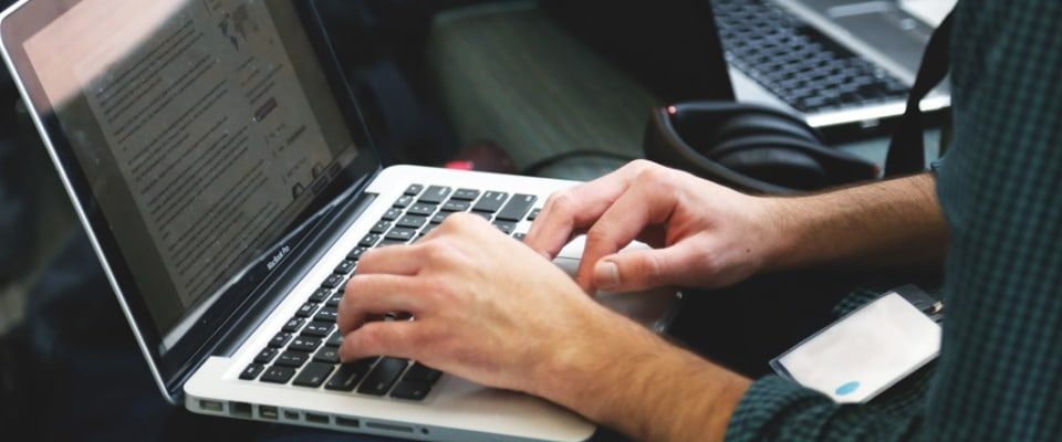 an image of a laptop useras partof their internship at encompass