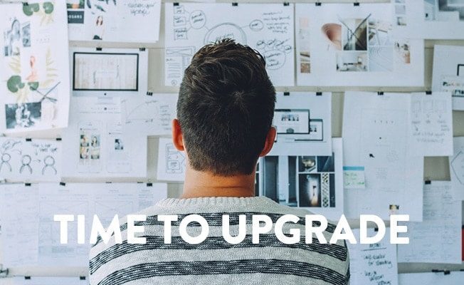 image of man pondering the costof doing nothing when its time to upgrade software.