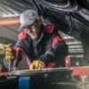 an image of a mechanic working on service shop efficiency