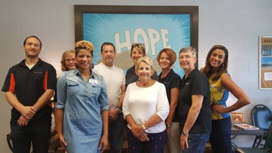 an image of volunteers during summer of service at the Salvation Army Of Greensboro center of hope.