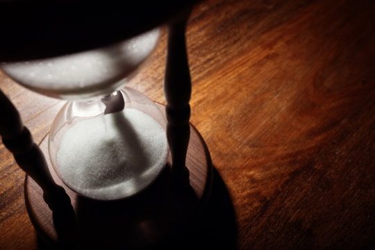 an image of an hourglass, signifying that when time is short an erp rapid implementation may be the best solution.