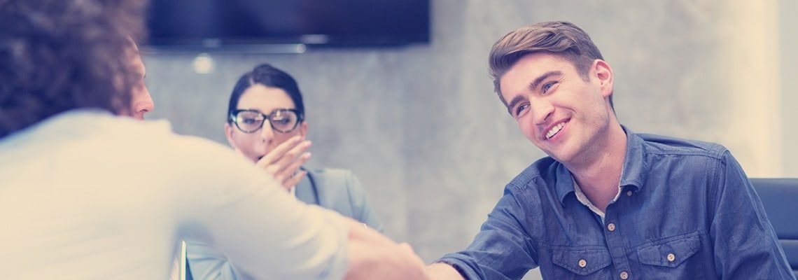 an image of a business owner and edi partner agreeing on an edi for small businesses contract