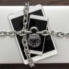 an image of computers, phones, and tablets under lock and key as part of 7 simple ways to keep your data safe