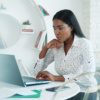 an image of a woman continuing a project remotely as part of project continuity