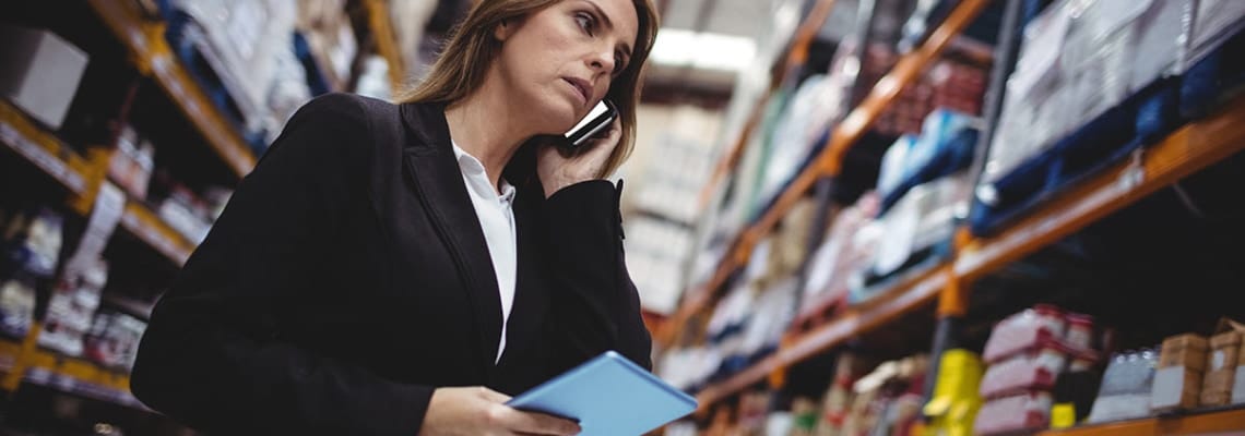 an image of a woman in a warehouse as part of inventory management