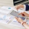 an image of employees using epicor advanced financial reporting tools