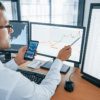 an image of a business person using business intelligence and analytics software, like Epicor data analytics (EDA) for Epicor ERP