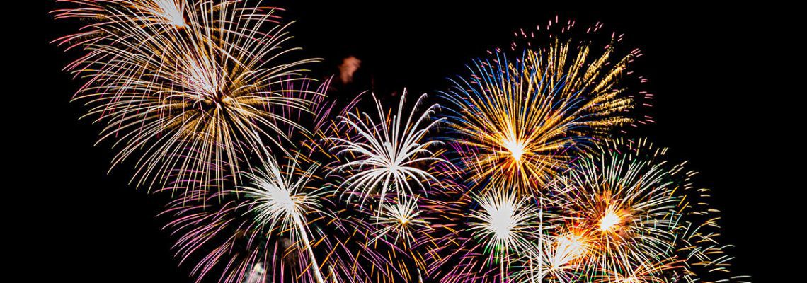 an image of encompass solutions 20th anniversary celebration with a fireworks display